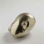 Constantin Brancusi. Musa dormiente, 1910, bronzo, 16.5x26x18 cm.