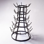 Marcel Duchamp. Scolabottiglie, 1914 -1964, ready-made, in ferro galvanizzato, 59 x 37cm.