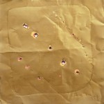 Concetto spaziale, 1959, rame con buchi e incisioni, cm. 22,5×22,9