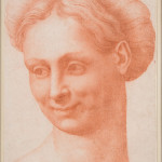 Testa di una donna che porta una ghirlanda