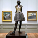 Edgar Degas. Small Dancer Aged 14. Cast in 1922, sculpture modeled c. 1879–80. Bronze partly tinted, tulle tutu, pink satin ribbon in the hair, wooden base. Orsay Museum, Paris